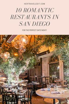 an outdoor restaurant with tables, chairs and chandeliers in the background text overlay reads 10 romantic restaurants in san diego for the perfect date night