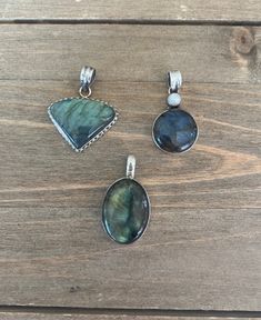 "Three pendants made of silver and labradorite. Stunning, hand made pieces. Chains are not included. Your choice of stones measure as follows: Triangle measures 1-1/2\" wide x 1\" tall; oval measures 1-1/4\" x 7/8\"; circle is 7/8\" diameter. Combined shipping is provided. If it is not calculated at checkout I will correct and issue a refund of the shipping overcharge. Please message me if you have any questions. View my shop at https://CollectWithJoy.etsy.com" Blue Carnival Glass, Heart Shaped Jewelry, Small Quilts, Silver Pendants, Star Fashion, Pendant Necklaces, Belly Button Rings, Labradorite, Jewelry Necklace Pendant