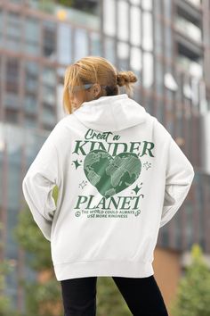 Create a kinder planet hoodie- Oversized Hoodie, Trendy Hoodie, Tumblr Hoodie, Aesthetic Hoodie, Perfect gift, Aesthetic Clothes Trendy Y2k  This unisex heavy blend hooded sweatshirt is relaxation itself. Made with a thick blend of cotton and polyester, it feels plush, soft and warm, a perfect choice for any cold day. In the front, the spacious kangaroo pocket adds daily practicality while the hood's drawstring is the same color as the base sweater for extra style points.\n.: 50% cotton, 50% pol Oversized Hooded Sweatshirt For School, Winter School Hoodie With Graphic Print, Winter Graphic Print Hoodie For School, Aesthetic Cotton Hooded Hoodie, Oversized Winter Hoodie For School, Trendy Cotton Hoodie For School, Gift Aesthetic, Girls Hoodie, Hoodie Aesthetic