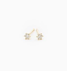 A classic pair of stud earrings you will never take off. Made to sparkle all night, these diamond studs also feature a six-prong setting that create a rounder effect on the solitaire. Made to mix and match with the rest of your earring collection. We love how versatile these lovely studs are. Minimalist Solitaire Diamond Earrings, 14k Gold Solitaire Earrings, Everyday Diamond Solitaire Earrings, Minimalist Diamond White Solitaire Earrings, Everyday Solitaire Diamond Earrings, Minimalist Solitaire Round Cut Earrings, Minimalist Solitaire Earrings, 14k White Gold Solitaire Earrings, Solitaire Round Cut Earrings For Everyday