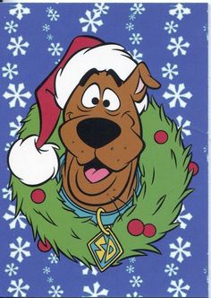 an image of a dog wearing a santa hat and wreath on a blue background with snowflakes