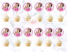 twelve cupcakes with the faces of two women in pink and white on them