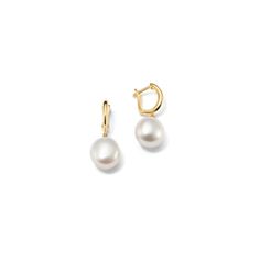 Perfect for a June birthday or any pearl lover  these simple and sophisticated charm hoops each feature a baroque cultured freshwater pearl. They’re crafted in quality 14-karat yellow gold vermeil (pronounced ver-may)  which features a thick layer of 14-karat gold plating on sterling silver. Each pair of hand-matched pearls is unique and will vary slightly from the images shown. Classic Baroque Pearl Earrings With Pearl Charm, Classic Huggie Jewelry With Pearl Charm, Classic Briolette Yellow Gold Pearl Earrings, Classic Yellow Gold Briolette Pearl Earrings, Classic Round Baroque Pearl Earrings, Classic Yellow Gold Pearl Earrings With Pearl Charm, Elegant Pearl Charm Huggie Earrings, Elegant Huggie Pearl Charm Earrings, Classic Yellow Gold Hoop Pearl Earrings