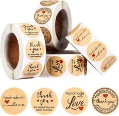 several rolls of handmade thank you stickers on top of each other with hearts