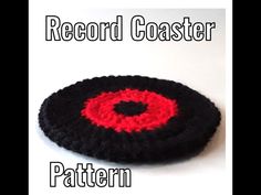 a crocheted black and red object with the words record coaster pattern