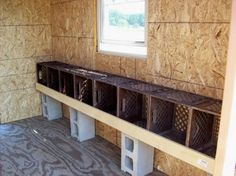 the inside of a house that is being built with plywood and wood panels on the walls