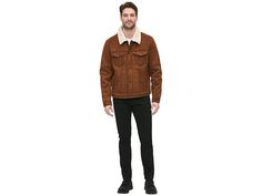 Levi's(r) Faux Shearling Trucker Jacket with Sherpa Lining - Men's Clothing : Brown : Add a little retro flair to your cold weather wardrobe with the Levi's Faux Shearling Trucker Jacket with Sherpa Lining, a zip-front coat featuring chest flap pockets, lower welt hand pockets, and laydown collar. Full-length sleeves with button cuffs. Logo tab at left chest pocket. 99% polyester, 1% spandex. Machine washable. Imported. Mens Levis, Trucker Jacket, Levis Men, Flap Pocket, Classic Looks, Chest Pocket, Vest Jacket, Faux Suede, Cold Weather