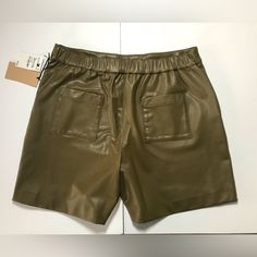 Halogen Cute New Olive Faux Leather Shorts With Pockets And Elastic Waist. Two Minor Indentations On Waist (See Pictures). Casual Leather Bottoms In Solid Color, Casual Solid Color Leather Bottoms, Casual Solid Leather Bottoms, Casual Short Leather Bottoms, Casual Faux Leather Bottoms Short Length, Casual Faux Leather Short Bottoms, Casual Faux Leather Bottoms, Casual Faux Leather Shorts For Fall, Casual Faux Leather Shorts