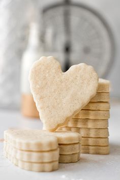 a stack of cookies with a heart shaped cookie on top