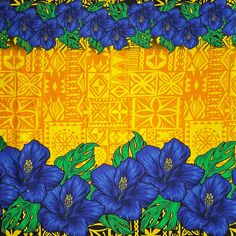 blue flowers on yellow background with green leaves