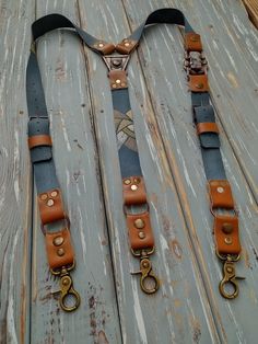 Suspenders Women  Blue Suspenders  Women Leather Suspenders Leather Suspenders  Leather Suspenders For Women  Rustic Suspenders  Suspenders gift Women's suspenders  Length suspenders  from 104-106 cm.+-2 cm  40.94 -41.73 inch +- 0.78 inch. Width leather 2.5 cm. - 0.98 inch. Metals: copper,brass. Materials: bead Leathers colors: Blue/Tan. Clips from stainless steel on the suspenders are very strong. Individual orders for leather suspenders are accepted. Write me your size before ordering. Leather suspenders are made entirely by hand from creating an idea, cutting leather, selecting colors, applying paints to it and to metal fittings that are made entirely by hand from forged copper and brass.  Choose the option of suspenders with clips or with carabiners. clasps. You can also change the ele Suspenders Women, Suspenders Pants, Blue Suspenders, Leather Suspenders, Suspenders For Women, Copper And Brass, Copper Brass, Bead Leather, Women Leather