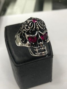 It is a carefully crafted product made of 925 sterling silver. Gothic Silver Skull Ring, Symbolic Engraved Skull Ring, Gothic Skull Rings With Engraving, Gothic Sterling Silver Rings With Skull Print, Gothic Silver Ring With Skull Print, Gothic Skull Ring For Formal Occasions, Skull Shaped Sterling Silver Ring In White Gold, Sterling Silver Skull Ring In White Gold, Formal White Gold Skull Ring