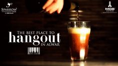 a person pours a drink into a glass with the caption, the best place to hangout in alwar