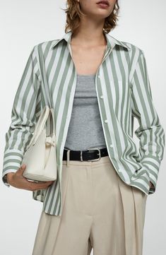 Awning stripes in a spearmint hue run up and down this button-up shirt made from crisp cotton. Front button closure Point collar Long sleeves with button cuffs Chest patch pocket 100% cotton Machine wash, line dry Imported Casual Shirt With Vertical Stripes For Office, Vertical Striped Shirt For Office In Spring, Vertical Stripes Shirt For Office In Spring, Spring Office Shirt With Vertical Stripes, Casual Green Shirt With Vertical Stripes, Trendy Green Office Shirt, Green Collared Shirt For Business Casual, Green Relaxed Fit Shirt For Business Casual, Spring Striped Shirt With Button Cuffs