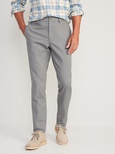 Slim Fit Tapered Leg Dress Pants With Pockets, Relaxed Fit Full-length Chinos With Belt Loops, Casual Mid-rise Chinos With Belt Loops, Casual Fitted Dress Pants With Welt Pockets, Slim Fit Full-length Bottoms With Welt Pockets, Slim Fit Full Length Bottoms With Welt Pockets, Slim Fit Bottoms With 5-inch Inseam For Spring, Fitted Mid-rise Chinos With Pockets, Spring Tapered Leg Bottoms With Zip Fly