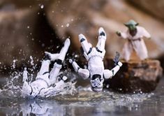 star wars action figures splashing in the water