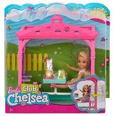 the barbie club chelsea doll plays with her tea set in its pink plastic play house