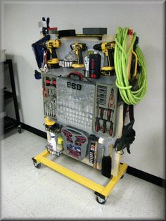 a work bench with tools on it in a garage