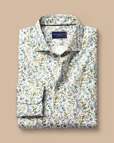 100% cotton, Available in classic and slim fit, Made with Liberty fabric, made in Italy, Exclusively designed for CT, Semi-spread collar, Rounded button cuff with one button, Classic and slim fit: back pleats, Machine washable - Made with Liberty Fabric Semi-Cutaway Collar Floral Print Shirt - Multi | Men's Charles Tyrwhitt Made With Liberty Fabric Semi-Cutaway Collar Floral Print Casual Shirt Size Large Cotton Charles Tyrwhitt Shirt, Mens Polo T Shirts, Business Casual Shirts, Cutaway Collar, Charles Tyrwhitt, Floral Print Shirt, Print Inspiration, Polo T Shirts, Liberty Fabric