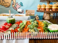 a tray filled with lots of different types of vegetables