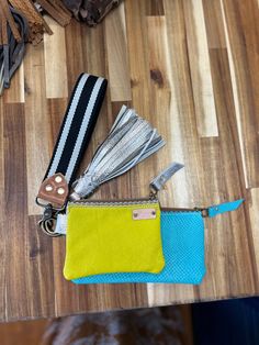 Every girl needs a cutie zip to add to their Indigo Laine collection. Made of 100% leather in the heart of South Texas, this bag carries cards, cash and a lipstick with ease. Carry it solo or stack it with our Sheila Wristlet, Uptown Zip and fun leather tassel! Make it your own! Measures 5” X 3.5” Features a 1” brass ring perfect for clipping to a wristlet. Made in TX Trendy Everyday Use Clutch, Gold Wallets With Zipper Pouch For Everyday Use, Gold Wallet With Zipper Pouch For Everyday Use, Gold Wallet For Everyday Use, Trendy Gold Wristlet For Everyday Use, Trendy Everyday Wristlet With Zipper Pouch, Adjustable Bags With Card Slots For Everyday Use, Gold Clutch Wristlet For Everyday Use, Gold Rectangular Wristlet For Everyday Use