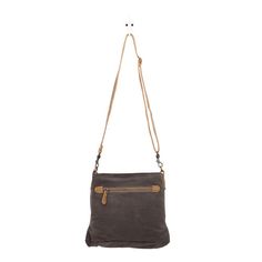 "Posy Shoulder Bag This stylish crossbody bag combines functional design with chic high fashion for everyday use. PLEASE NOTE: Each of these bags is truly an original! Much of the materials are recycled from used tarps and tents. These tarps have literally traveled the world and carry the scars and bruises of use. Though we take great care to launder all of our materials and thoroughly clean them, each bag will sport its own unique marks of wear and tear. Slight variations, including stitch mark Canvas Crossbody Bag With Adjustable Strap, Canvas Crossbody Shoulder Bag For Everyday Use, Everyday Canvas Crossbody Shoulder Bag, Chic Canvas Crossbody Shoulder Bag, On-the-go Crossbody Canvas Bag With Adjustable Strap, On-the-go Adjustable Strap Crossbody Canvas Bag, Crossbody Canvas Bag With Leather Handles, Trendy Crossbody Canvas Bag For Everyday Use, Trendy Canvas Crossbody Bag For Everyday Use