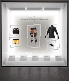 a display case with clothes and shoes in it