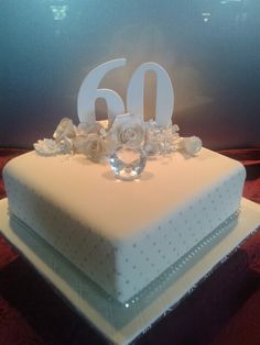 a white cake sitting on top of a table