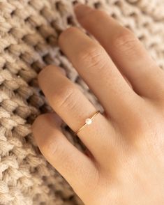 Our Pearl Ring is stunningly simple, and a staple piece for any wardrobe. This gold filled band ring features one of our pearls on an understated setting that completes the look. The Pearl Ring will live happily in your collection forever. Details: -Gold Filled -Size: 6, 7, 8, -Waterproof, Tarnish Free, Hypoallergenic Simple Dainty Rings, Dainty Pearl Ring, Simple Pearl Ring, Pearl Promise Rings, Pearl Ring Simple, Pearl Ring Gold, Promise Rings Simple, June Birthstone Ring, Ring Pearl