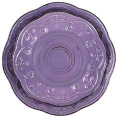 purple glass bowl with beading on the rim