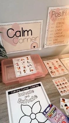 a table topped with lots of cards and magnets