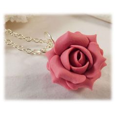 Handcrafted pink rose necklace available in colors. This pink flower necklace is offered in colors of mauve, violet, fuchsia, blush, dusty pink and more. This little simple adoring pink rose pendant is great for bridesmaid jewelry with a  pink wedding theme. Petite style rose pendant drops from a hand wired bail and from a cable chain. Other matching accessories available. -Original hand sculpted polymer clay flowers -Durable, water-resistant -No molds, no paint, no glue -Flower Size : Petite 1.5cm -Chain Length : Choose 16 or 18 inch -Components : Silver-plated, Gold-plated, Antique Brass, 925 sterling Silver or 14k Gold Filled Pictured : Vintage Pink View matching: Pink Rose Stud Earrings : https://www.etsy.com/listing/61621096 Pink Rose Drop Earrings : https://www.etsy.com/listing/61685 Pink Flower Charm Necklace For Wedding, Delicate Pink Necklace For Bridesmaid Gift, Feminine Rose Design Wedding Necklace, Pink Flower Pendant Jewelry With Rose Design, Feminine Rose Design Necklace For Wedding, Feminine Rose Design Necklaces For Wedding, Pink Wedding Necklace With Flower Charm, Pink Necklace With Flower Charm For Wedding, Elegant Pink Rose Necklace