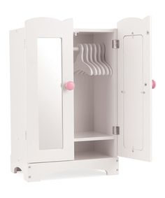 an open white cabinet with pink knobs