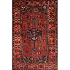 an antique persian rug with red, blue and orange colors on the border is shown