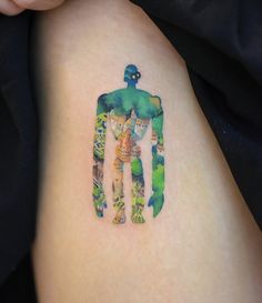 a person with a tattoo on their arm