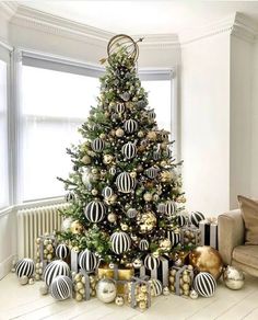 a decorated christmas tree in a living room