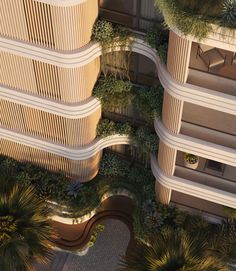 an aerial view of two buildings with plants growing on the balconies and in between them