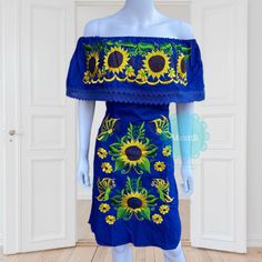 "Lace Trim Off the shoulder tie back Mexican dress with beautiful sunflower embroidery. Made out of manta, 100% cotton. Color:Blue Small/Medium Bust- 42\" Hips- 42\" Waist- 42\" Length- 35\" Large Bust- 48\" Hips- 48\" Waist- 48\" Length- 39\" X-Large Bust- 52\" Hips- 52\" Waist- 52\" Length- 39\" 🧵Made in Chiapas, Mexico. 🧺Care Instructions: We recommend hand washing, lay flat to dry. 📲Please feel free to message me with any questions regarding sizing and fit. 📷Additional photos can be prov Bohemian Embroidered Off-shoulder Summer Dress, Bohemian Off-shoulder Embroidered Summer Dress, Fitted Bohemian Sundress With Floral Embroidery, Bohemian Off-shoulder Embroidered Dress, Sunflower Embroidery, Mexican Sunflower, Frida Kahlo Style, Mexican Embroidered Dress, Fiesta Dress