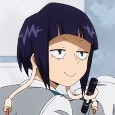 an anime character holding a cell phone in her hand