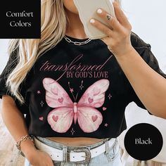 Unisex Comfort Colors® Pink Elegant Butterfly Christian Transformed By God's Love T-Shirt ( With so many color options, if you are struggling to pick one or would like to see one not listed or the design more up-close a color, please reach out and we will check availability or send you some pics.) Embrace the beauty of transformation with this Comfort Colors™ 1717 T-Shirt in soft light pink. Featuring a delicate and elegant front graphic of a butterfly, stars, and hearts floating in the background, the shirt proudly displays the uplifting message "Transformed By God's Love." This beautifully simple design captures the essence of faith and spiritual renewal, making it perfect for any believer who appreciates understated, meaningful fashion. Made with high-quality, comfortable fabric, this t Stars And Hearts, Inspirational Tees, Uplifting Messages, Baptism Gifts, Love Shirt, Love T Shirt, Christian Shirts, Pick One, Soft Light