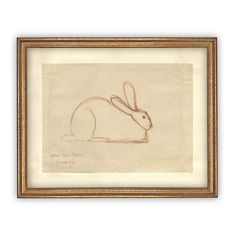 a drawing of a rabbit sitting in front of a white wall with black frame on it