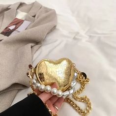 UAKISS - Korean 2024 New Brand Women's Heart Chain Shoulder Bag Mini Pearl Mouth Red Bag Fashion Luxury Design Wallet for Women Y2k Ins size : Length: 10cm Width:2cm Height: 9 cm Shoulder strap length: 112cm The values are all manually measured, and if there is an error of 1-3cm, it is within the normal range Trendy Gold Handheld Clutch, Gold Crossbody Shoulder Bag Gift, Trendy Clutch With Chain Strap For Gift, Trendy Portable Gold Clutch, Trendy Clutch With Chain Strap As A Gift, Trendy Gold Portable Shoulder Bag, Trendy Gold Shoulder Bag Portable, Gold Trendy Clutch For Gift, Trendy Gold Clutch For Gift