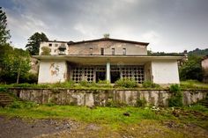 Abandoned mining ghost-town Jantuha, Abkhazia. Destroyed empty houses royalty free stock images Ghost Town, Ghost Towns