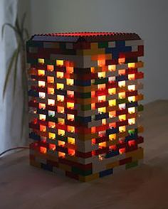 a lamp made out of lego blocks on a table