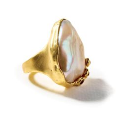 A designer piece, crafted from 18K gold-plated silver, showcasing a baroque pearl adorned with natural pink and yellow sapphires. This miniature sculpture of a ring is not just a mere decoration; it embodies a bold statement that commands attention. It stands as a singular creation, with no second copy in existence. Wear this contemporary piece, for it symbolizes artistic individualism that defies conformity and celebrates the beauty of originality.Silver 925Stones Baroque Pearl, Pink Sapphire, Yellow SapphirePlating Gold 18kWidth 28 mmBand wide 4.5 mmLength 22 mmWeight 18.47 g Luxury Gold Pearl Ring With High Luster, Luxury High Luster Gold Pearl Ring, Gold Heirloom Pearl Ring With Gemstone, Heirloom Gold Pearl Ring With Gemstone, Fine Jewelry Gold Pearl Ring With Gemstone, Luxury Gold Rings With Pearl Drop, Luxury Gold Pearl Ring With Gemstone, Gold Baroque Pearl Ring, Gold Baroque Pearl Ring As Gift