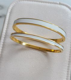 18K Gold Plated Stainless Steel *** Set of 2 bangles Thickness: 4mm & 6mm Model has a 6 inches wrist Gold Bangle Set, Gold Bangle, Bangle Set, Gold Bangles, 6 Inches, 18k Gold, Gold Plate, Bangles, Plating