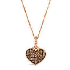 From Le Vian(R), this rich heart pendant is fashioned in 14k Strawberry Gold(tm). The pendant features an orderly array of 5/8ctw Chocolate Diamonds(R) and accenting 1/20ctw Nude Diamonds(tm) on the bale. Diamonds are 5/8tw and SI2 in clarity.  Natural fancy brown diamonds are available in shades from champagne to cognac to Chocolate Diamonds(R), Le Vian(R)'s original brand of natural fancy color brown diamonds. Chocolate Diamonds(R) are naturally flavored, the depth of their color determined by R Heart, Levian Chocolate Diamonds, Neutral Skin Tone, Brown Diamonds, Gold Heart Pendant, Wedding Day Jewelry, Brown Jewelry, Chocolate Diamonds, Le Vian