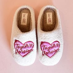 White fleece slippers with pink and red embroidered heart design featuring the words Taylor's Version. Gifts For Taylor Swift Fans, Gifts For Swifties, Taylor Swift Accessories, Ruby Woo Lipstick, Heart Plush, Taylors Version, One Piece Top, Plush Slippers, Cute Slippers