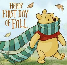 a cartoon winnie the pooh with a scarf around it's neck and an inscription that reads, happy first day of fall