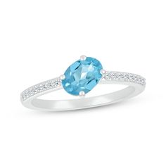 Offbeat and oh-so-colorful, this ring is a cheerful addition to her finger stack. Styled in sterling silver An oval-cut Swiss blue topaz is set on a tilt at the center Dainty round-cut white lab-created sapphires line the slender shank with sparkle White Lab, Swiss Blue Topaz, Ring Sterling Silver, Oval Cut, Blue Topaz, Women Rings, Round Cut, Topaz, Sterling Silver Rings